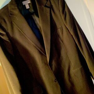 H&M men’s black pinstripe sports jacket. Pockets inside and outside. Size 44R